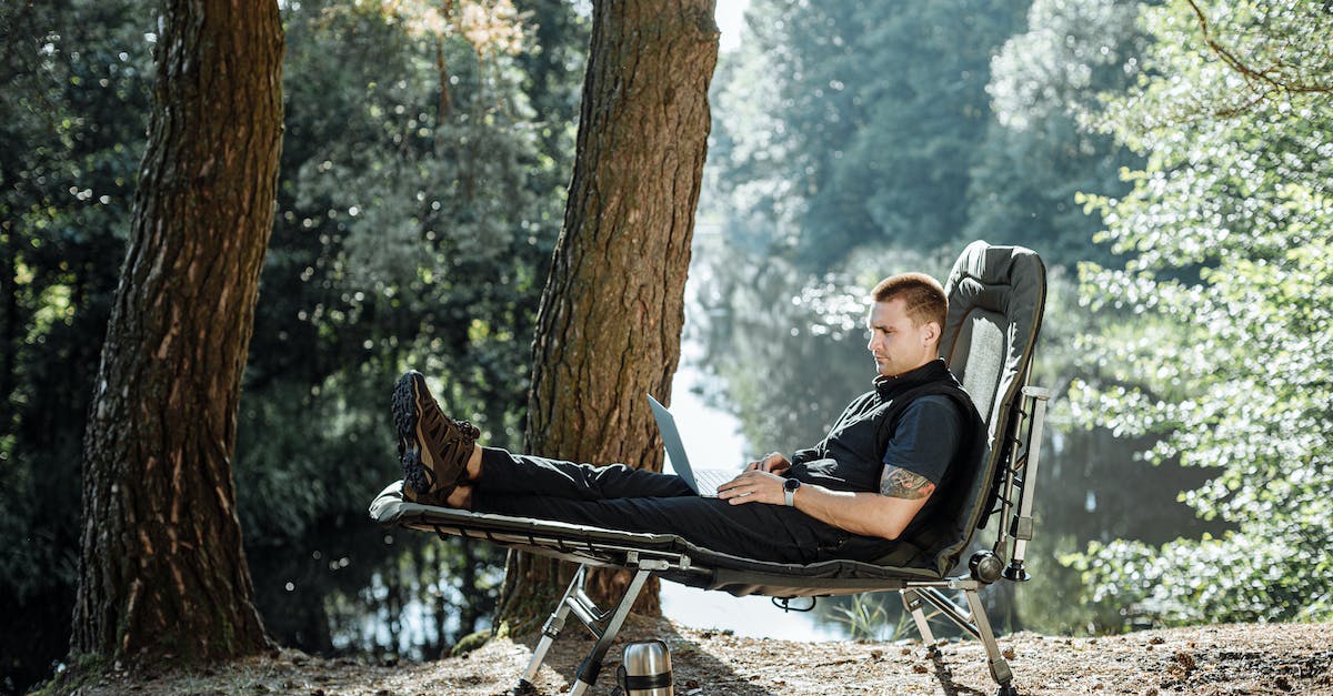 How safe is travelling on European rail networks for solo travellers? - Man in Red Shirt Sitting on Black and White Chair How safe is travelling on European rail networks for solo travellers? - Man in Red Shirt Sitting on Black and White Chair
