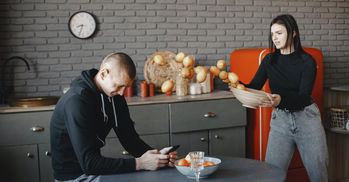 How severe will language problem be in Germany? - Man in Black Sweater Sitting on Chair How severe will language problem be in Germany? - Man in Black Sweater Sitting on Chair