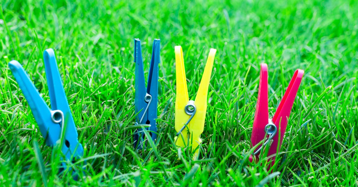 How should I wash clothes in Iceland? - Two Blue One Yellow and One Pink Clothes Clips on Green Grass How should I wash clothes in Iceland? - Two Blue One Yellow and One Pink Clothes Clips on Green Grass