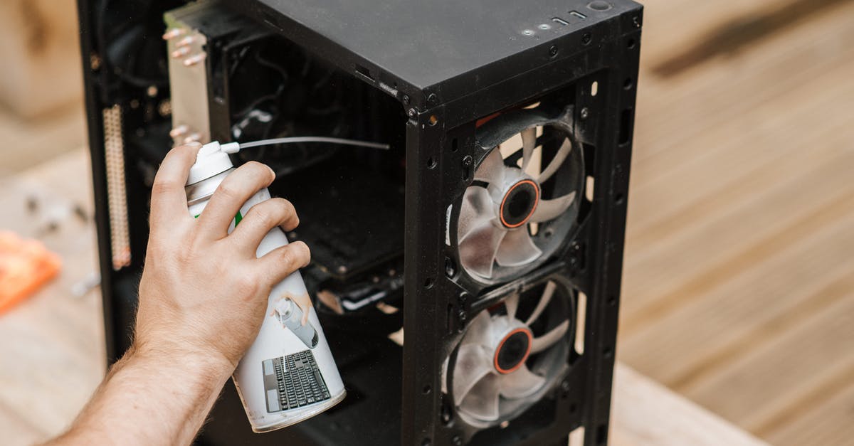 How Soon Can I Visit the UK From US? - Crop unrecognizable man cleaning computer system unit