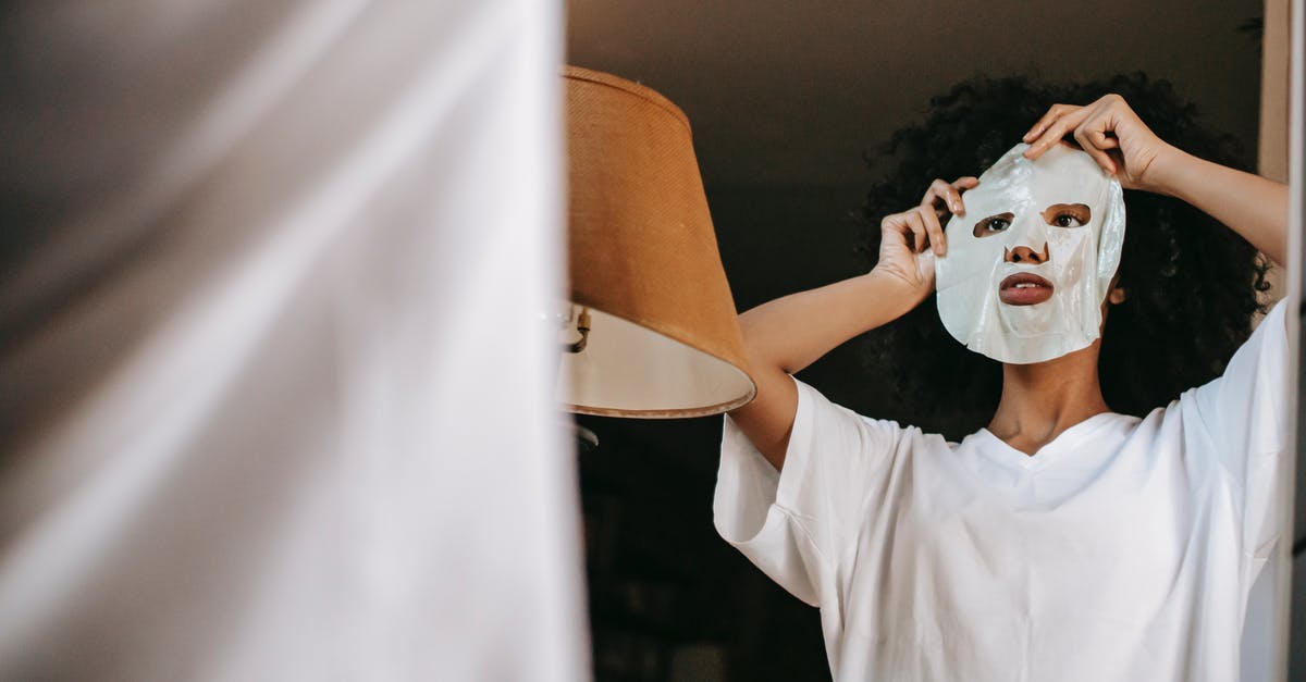 How to apply for a Schengen visa if I don't have payslips from the last 3 months? [duplicate] - From below of black female with curly hair in white t shirt standing near mirror in room and applying sheet mask in daytime