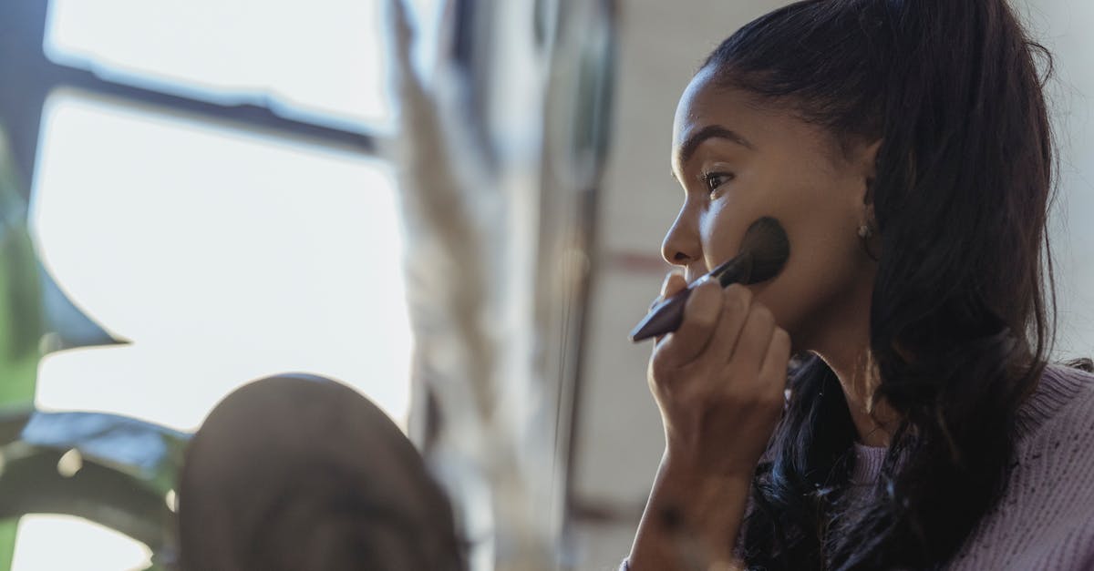 How to apply for a visa in Denmark for a personal business visit? - Black beauty artist rouging face in studio How to apply for a visa in Denmark for a personal business visit? - Black beauty artist rouging face in studio