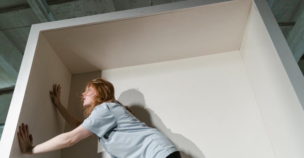 How to avoid claustrophobia on a plane? - A Fearful Woman Having Claustrophobia in a Cabinet How to avoid claustrophobia on a plane? - A Fearful Woman Having Claustrophobia in a Cabinet