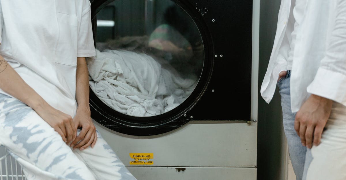 How to avoid to get your clothes to disappear in Indonesian laundry services? - People Wearing White Tops near a Washing Machine How to avoid to get your clothes to disappear in Indonesian laundry services? - People Wearing White Tops near a Washing Machine