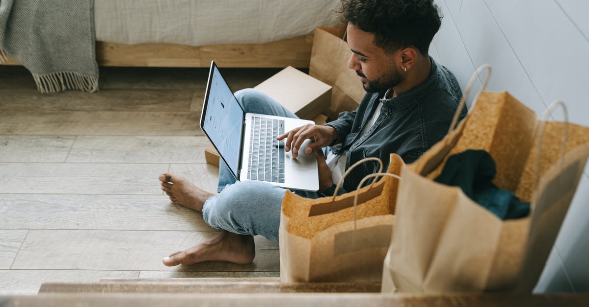 How to buy one airplane seat and reserve adjacent ones? - Man in Black Jacket Using Macbook How to buy one airplane seat and reserve adjacent ones? - Man in Black Jacket Using Macbook