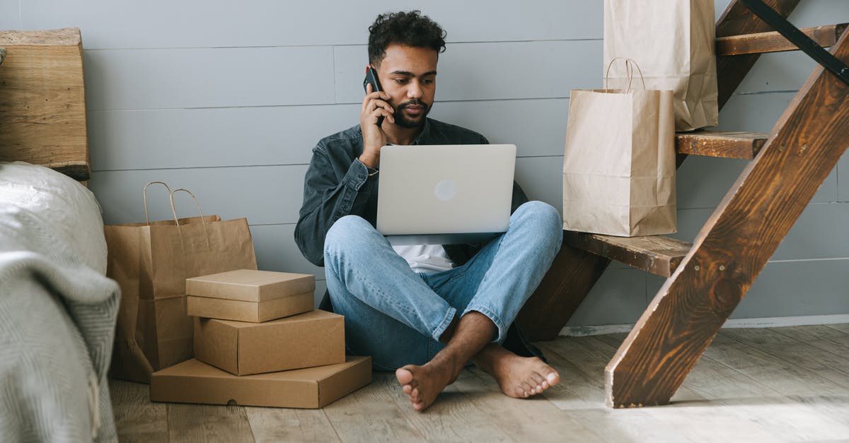 How to buy one airplane seat and reserve adjacent ones? - Man in Gray Crew Neck T-shirt and Blue Denim Jeans Sitting on Brown Sofa Chair How to buy one airplane seat and reserve adjacent ones? - Man in Gray Crew Neck T-shirt and Blue Denim Jeans Sitting on Brown Sofa Chair