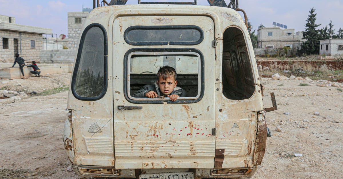 How to calculate the damage to a rental car? - Boy sitting in broken car How to calculate the damage to a rental car? - Boy sitting in broken car