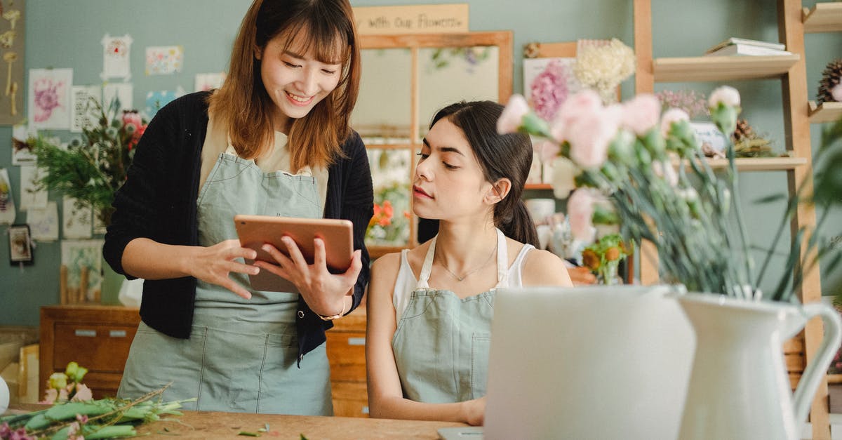 How to choose seat with JAL when online check-in is not available? - Content multiethnic female coworkers at table with flowers surfing tablet while choosing design for bouquet during work in florist shop How to choose seat with JAL when online check-in is not available? - Content multiethnic female coworkers at table with flowers surfing tablet while choosing design for bouquet during work in florist shop