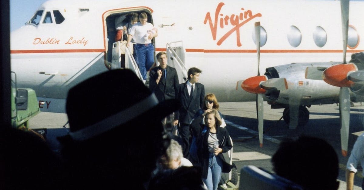 How to claim Virgin Train tickets towards Virgin Flying Club air miles, if not booked through their official website? [closed] - People Standing Near White Airplane