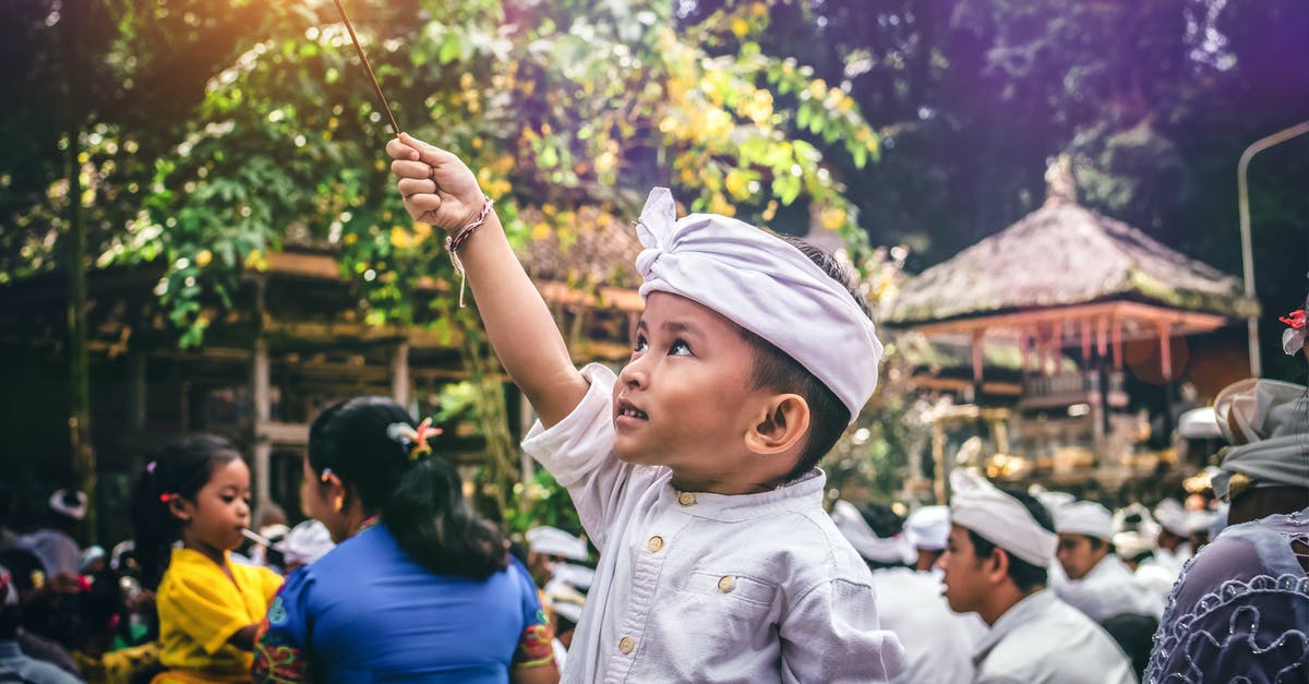 How to connect between Indonesian Air Asia and Jetstar at Denpasar (Bali) airport? - Boy Holding Sparkler How to connect between Indonesian Air Asia and Jetstar at Denpasar (Bali) airport? - Boy Holding Sparkler
