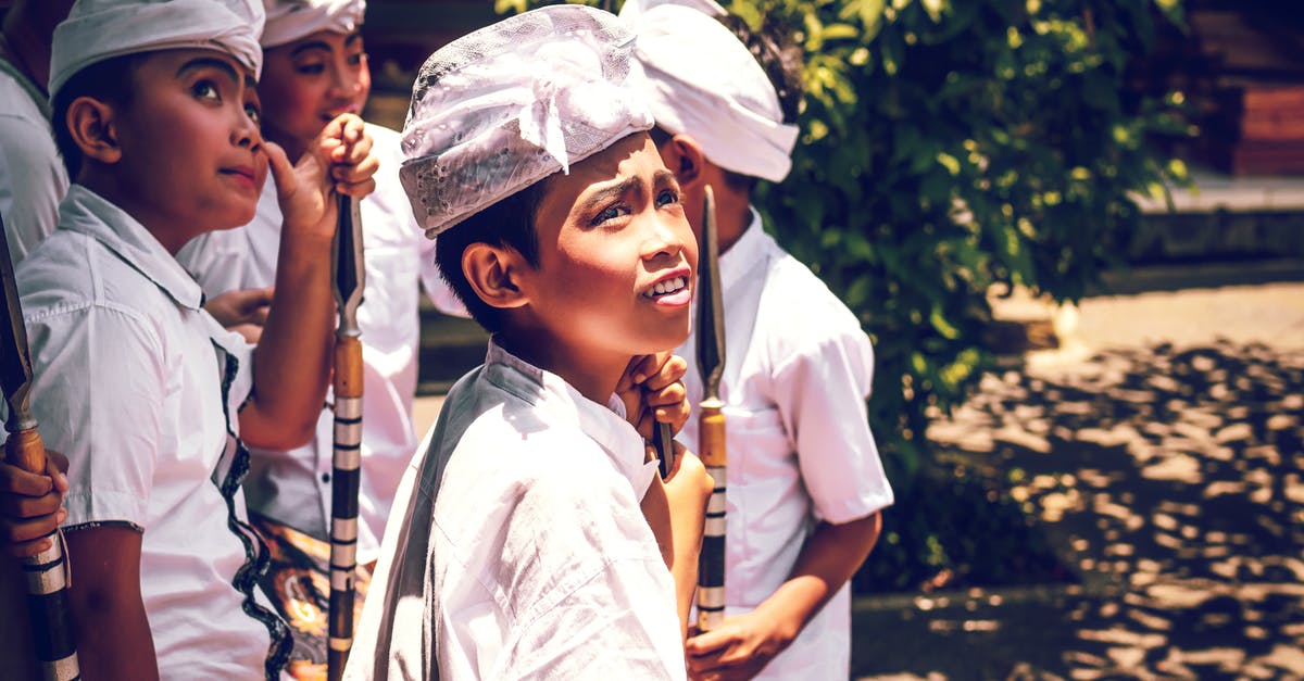 How to connect between Indonesian Air Asia and Jetstar at Denpasar (Bali) airport? - Four Boys Wearing White Hats Holding Spears How to connect between Indonesian Air Asia and Jetstar at Denpasar (Bali) airport? - Four Boys Wearing White Hats Holding Spears