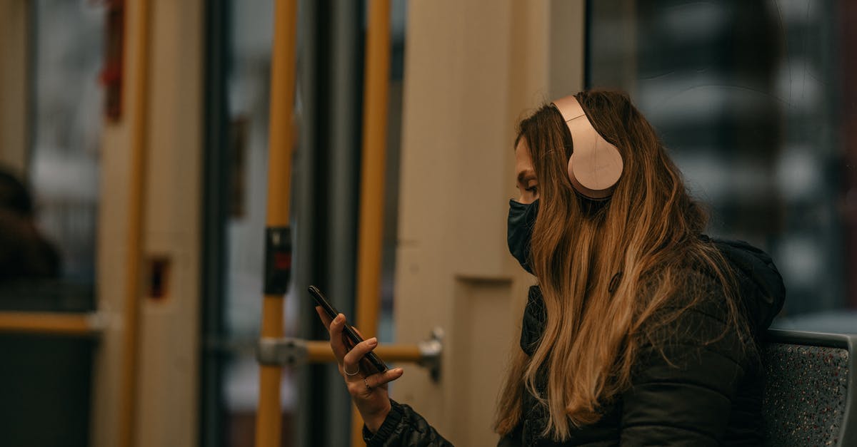 How to connect to public WiFi - Woman in Black Jacket Holding Smartphone Inside A Train How to connect to public WiFi - Woman in Black Jacket Holding Smartphone Inside A Train
