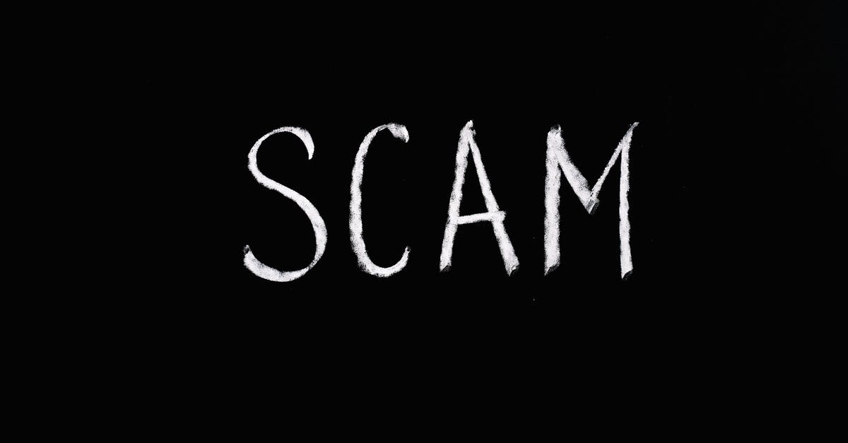 How to deal with the fake police scam in Spain? - Scam Lettering Text on Black Background