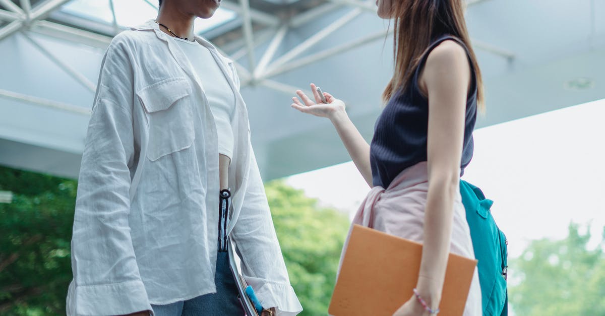 How to explain allowance received without any document from employer? - Multiethnic female students sharing information in campus How to explain allowance received without any document from employer? - Multiethnic female students sharing information in campus