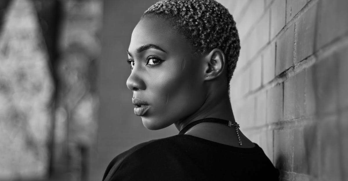 How to extend my short stay Schengen visa? [duplicate] - Beautiful African American Woman with Short Curly Fair Hair