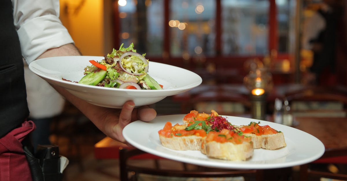 How to find a restaurant serving Halal food in Munich - Person Holding Pastry Dishes on White Ceramic Plates How to find a restaurant serving Halal food in Munich - Person Holding Pastry Dishes on White Ceramic Plates