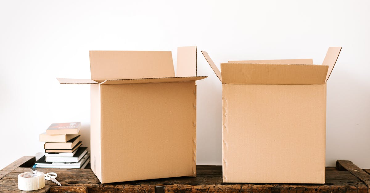 How to find accommodation that is not listed in booking websites? [duplicate] - Opened carton boxes and stacked books placed on shabby wooden desk with tape against white wall