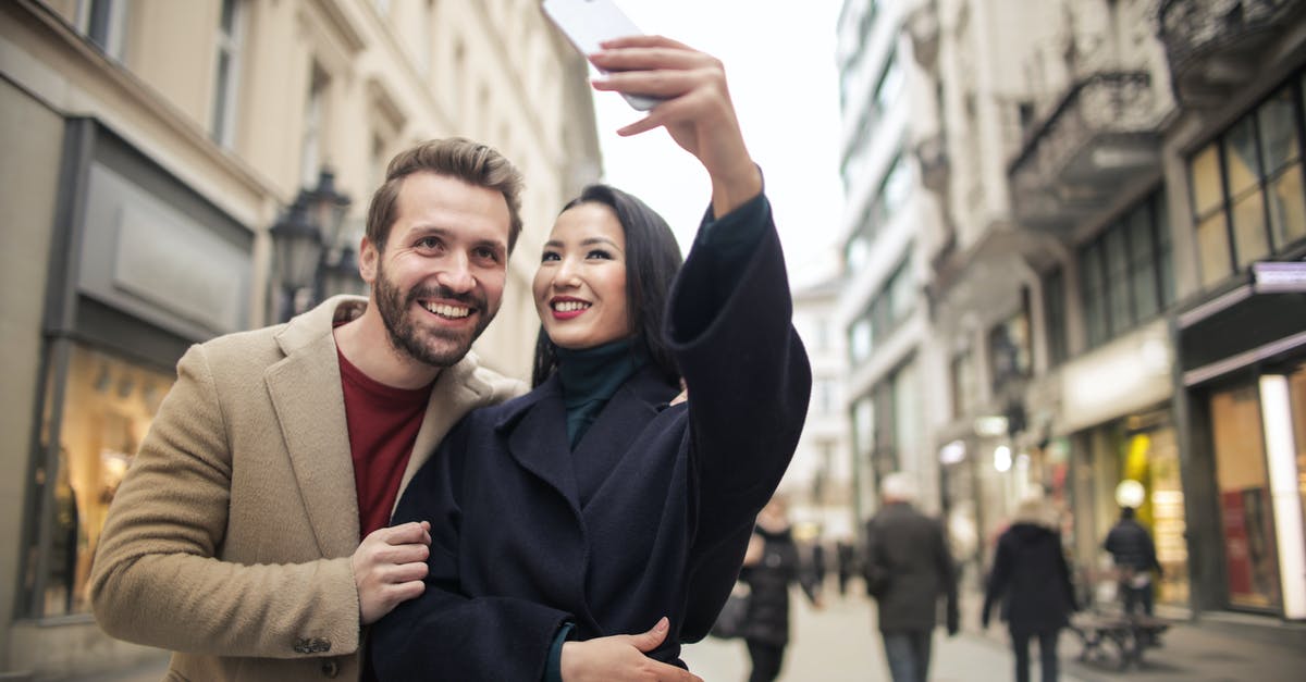 How to find all flights scheduled between a pair of cities? [duplicate] - Woman In Black Coat Taking Photos