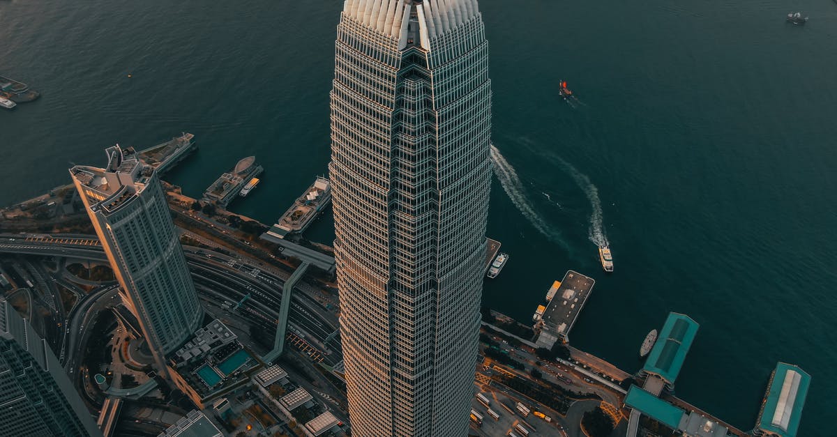 How to get a Hong Kong visa from Pakistan? - Geometric skyscraper located in city downtown at seafront How to get a Hong Kong visa from Pakistan? - Geometric skyscraper located in city downtown at seafront