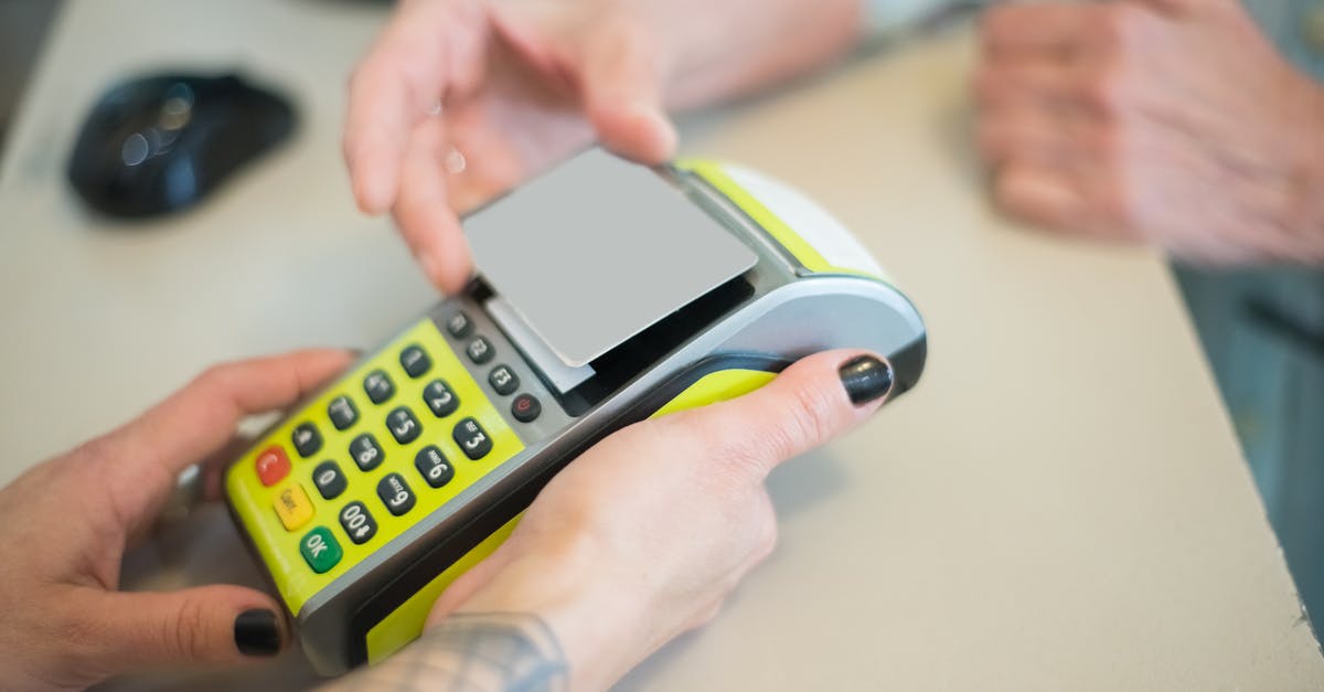 How to get a receipt when scanning my card on Tel Aviv buses? - A Woman Scanning Her Card