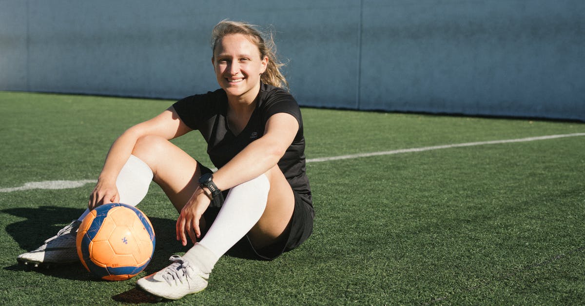 How to get football tickets for Premier League when traveling - Soccer Player Sitting On A Green Field How to get football tickets for Premier League when traveling - Soccer Player Sitting On A Green Field
