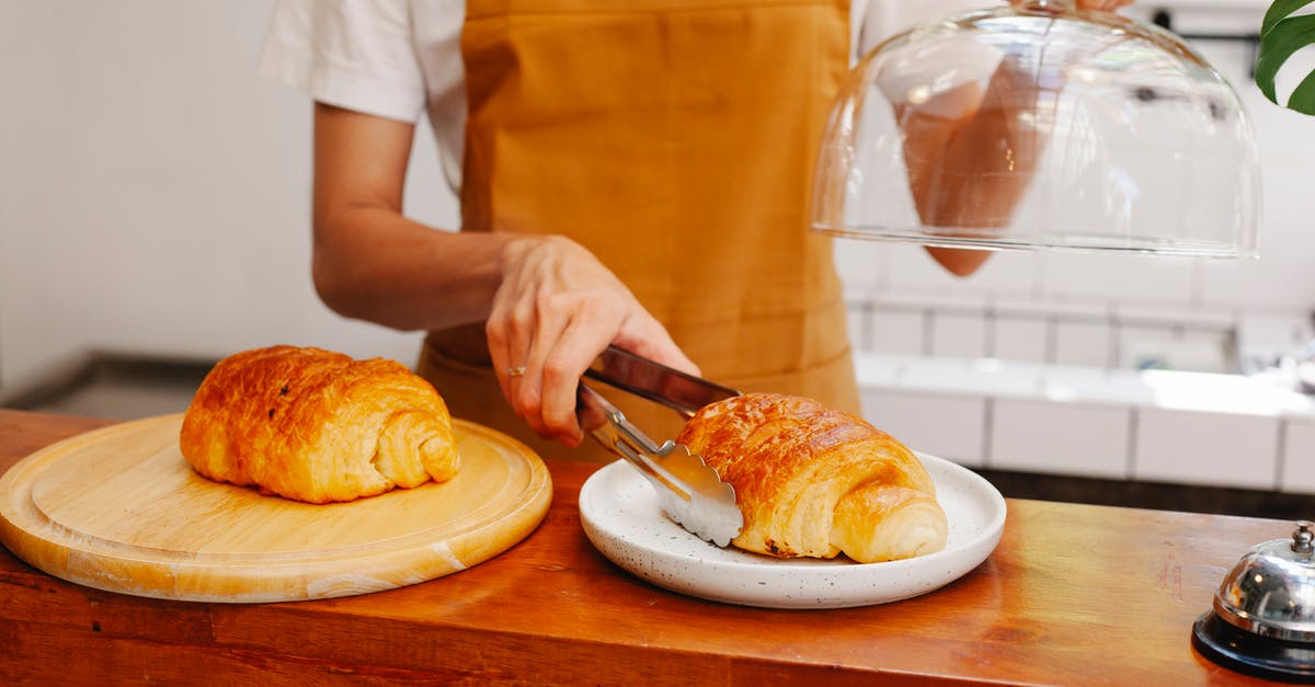 How to get from Put-O to Kyaing Tong - Crop baker putting appetizing puff on plate in cafeteria How to get from Put-O to Kyaing Tong - Crop baker putting appetizing puff on plate in cafeteria