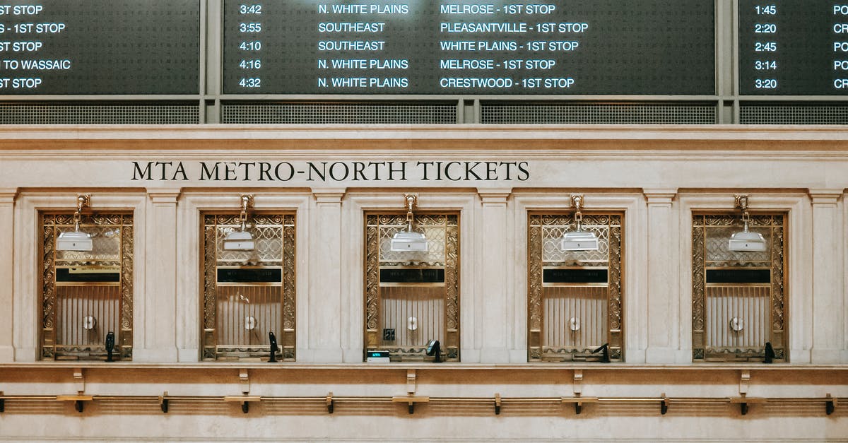 How to get landside in LHR T3 from US departure - Interior of old box office with golden details under schedule in Grand Central Terminal How to get landside in LHR T3 from US departure - Interior of old box office with golden details under schedule in Grand Central Terminal