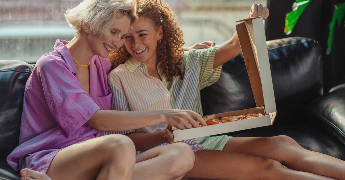 How to get PR in France or any European country as gay couple? [closed] - Women Sharing a Box of Pizza on a Couch