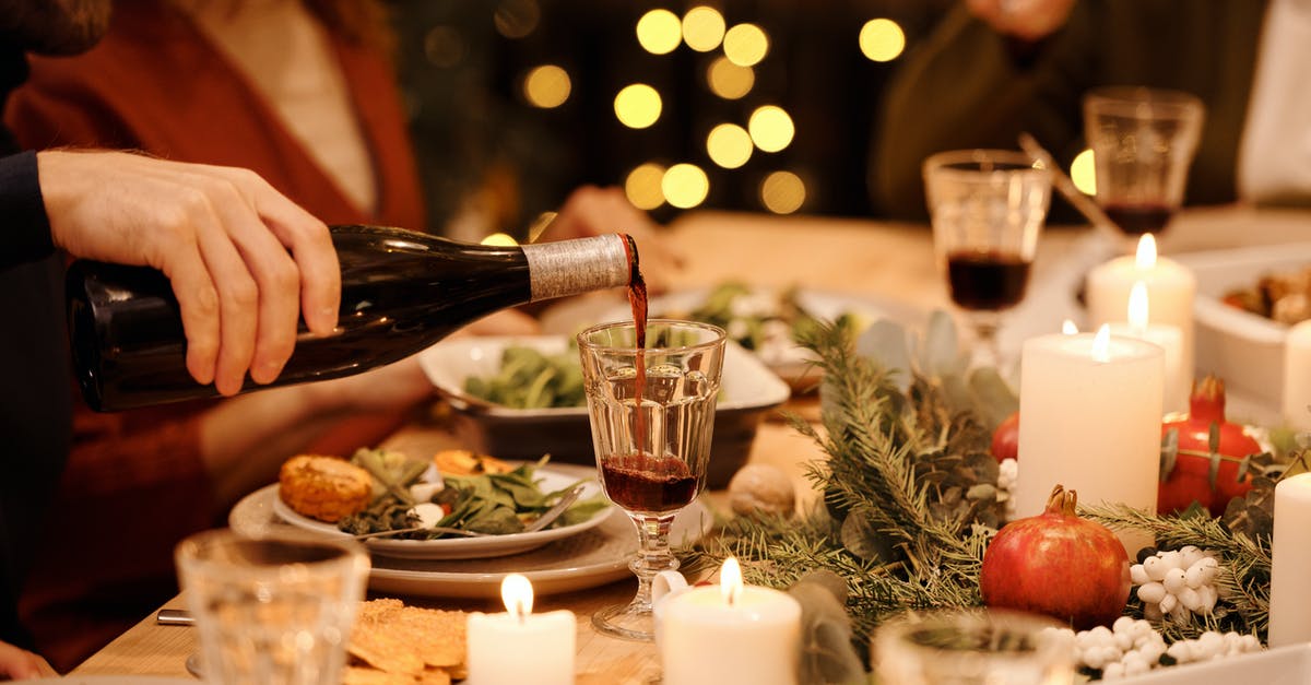 How to get to Christmas Island? - Person Pouring Wine on Glass How to get to Christmas Island? - Person Pouring Wine on Glass