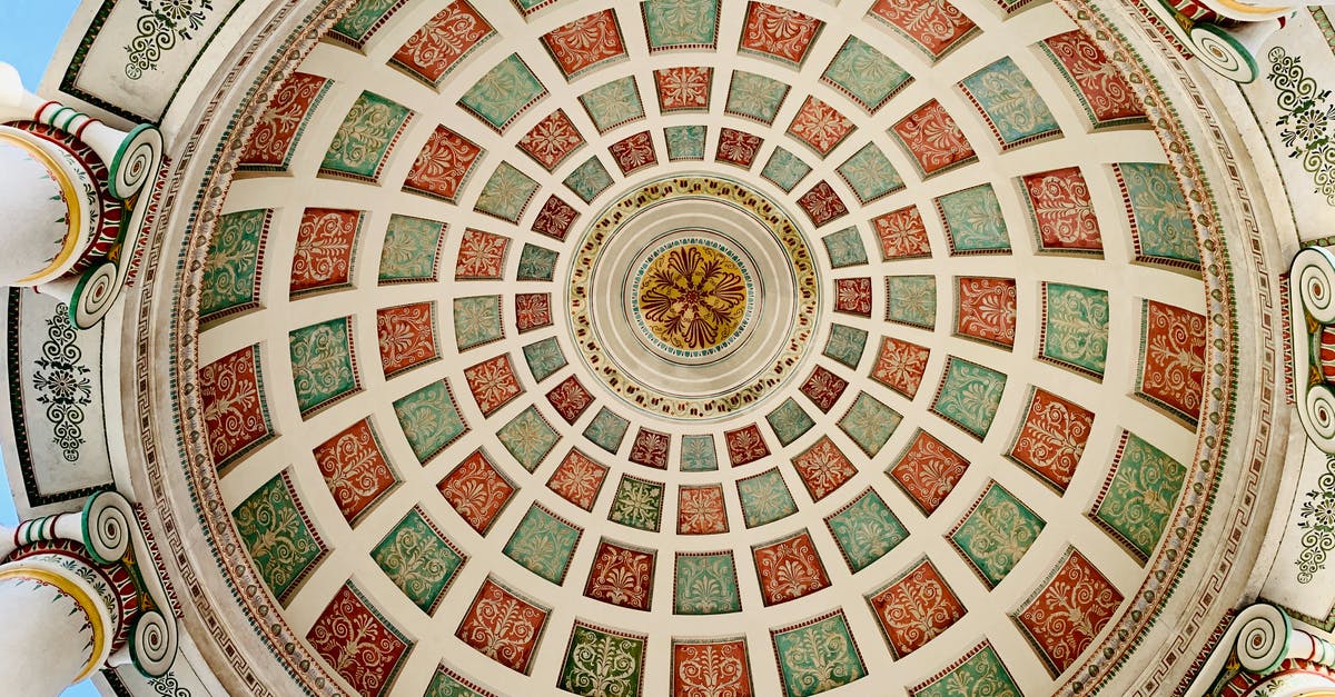 How to get to Munich from Helsinki? - Ornamental ceiling of aged colonnade on sunny day How to get to Munich from Helsinki? - Ornamental ceiling of aged colonnade on sunny day