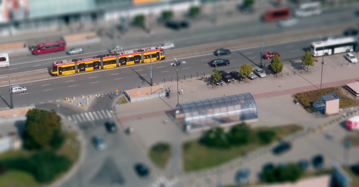 How to go from Warsaw Modlin airport to Warsaw? - Aerial View of Cars on Road How to go from Warsaw Modlin airport to Warsaw? - Aerial View of Cars on Road