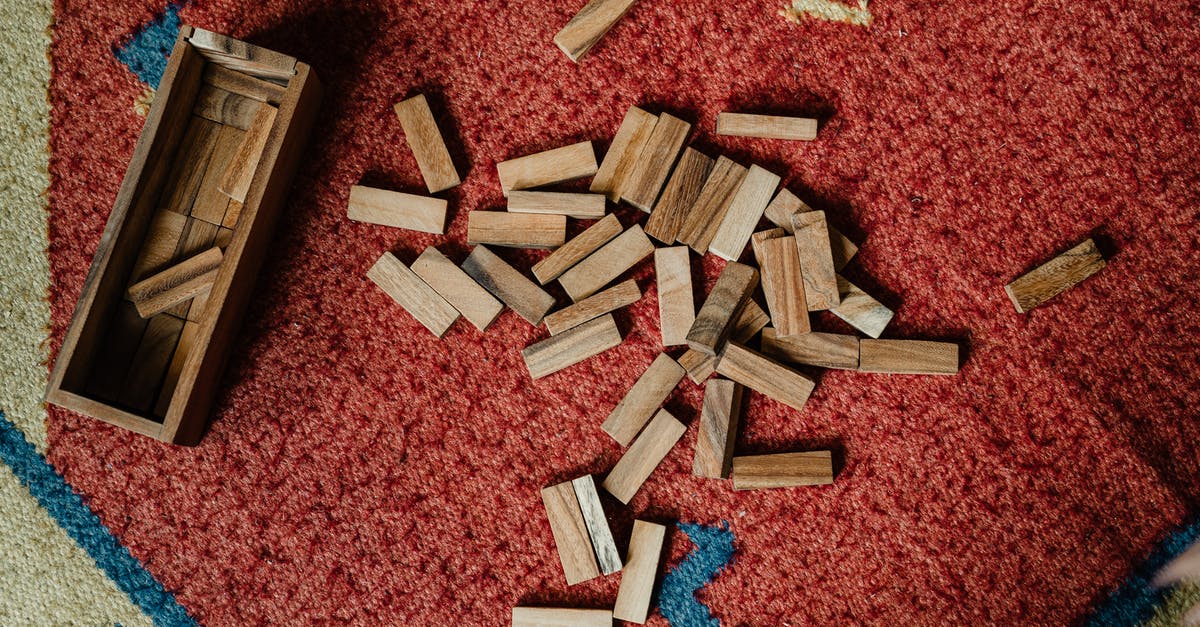 How to improve the chances of getting a free ticket from a "Blue Girl" at the Bayreuth Festival? - Top view of wooden box and pile of blocks for playing in jenga tower game arranged on floor carpet How to improve the chances of getting a free ticket from a "Blue Girl" at the Bayreuth Festival? - Top view of wooden box and pile of blocks for playing in jenga tower game arranged on floor carpet