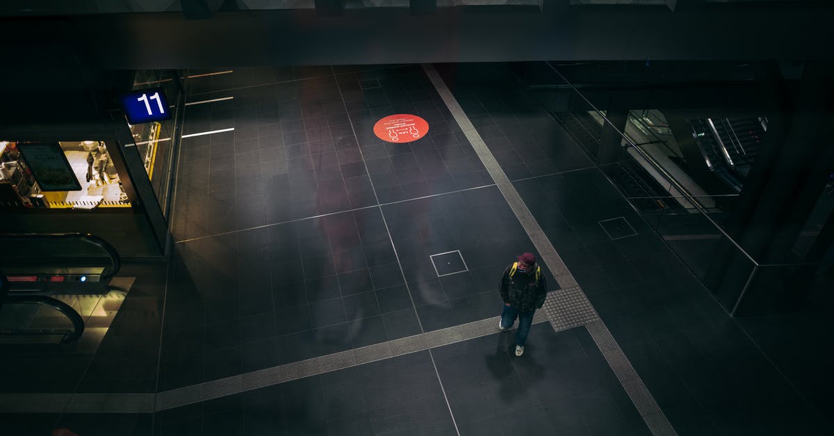 How to know whether a travel agent issues tickets instantly? - Man in Black Jacket and Black Pants Walking on Basketball Court How to know whether a travel agent issues tickets instantly? - Man in Black Jacket and Black Pants Walking on Basketball Court