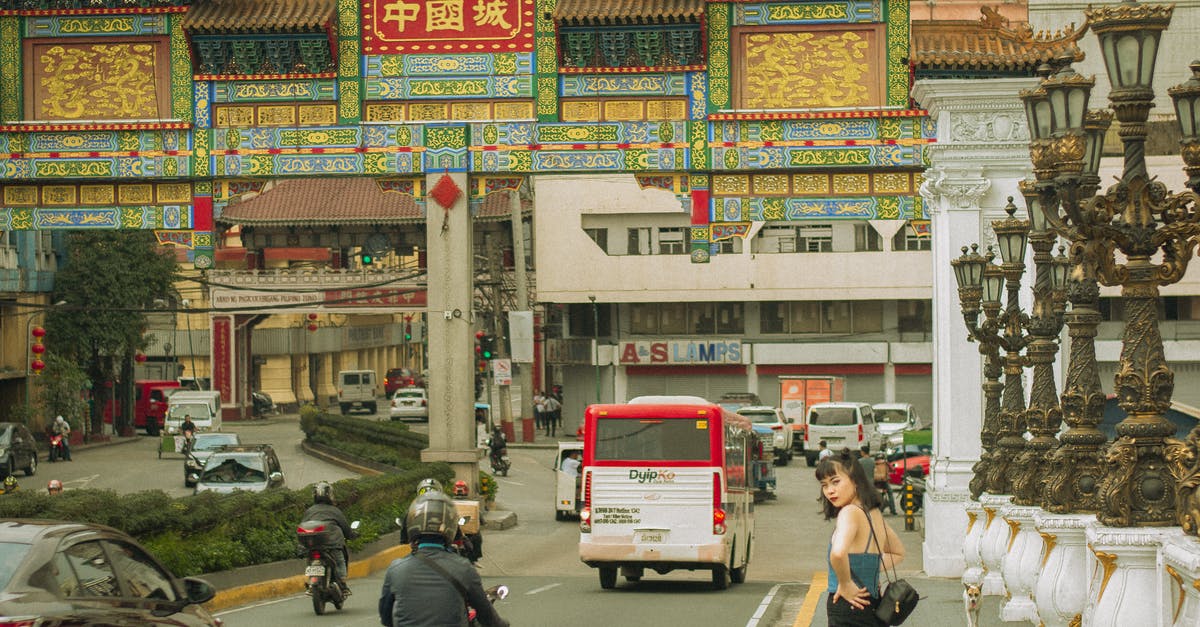How to legally drive in the Philippines as a foreigner? - Various vehicles riding on street near traditional buildings in Binondo district located in Manila How to legally drive in the Philippines as a foreigner? - Various vehicles riding on street near traditional buildings in Binondo district located in Manila