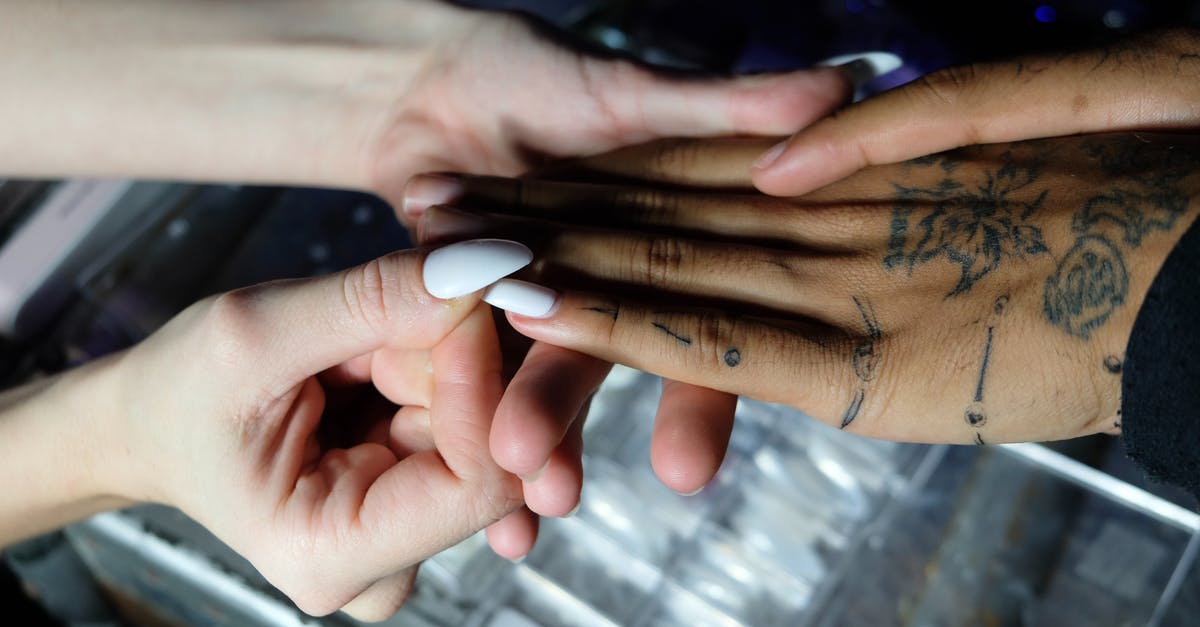 How to make use of flight tickets to Prague when I can't apply for a Schengen visa [duplicate] - Woman doing manicure to ethnic client