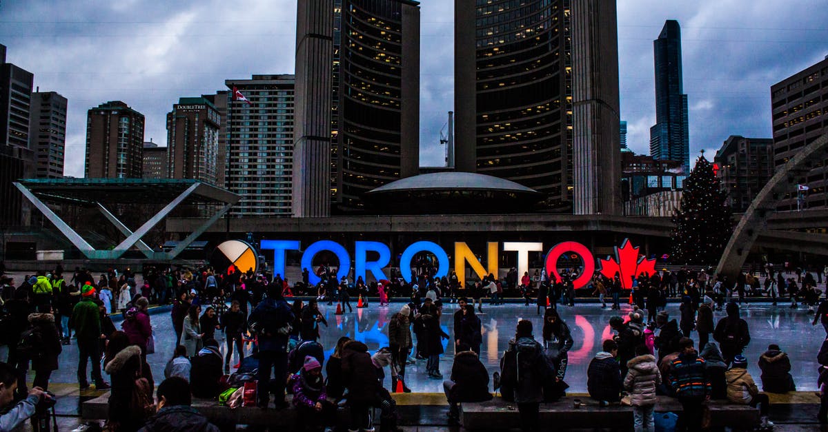 How to obtain a 60-day Indonesian tourist visa in Singapore? - People Gathered in Front of Toronto Freestanding Signage How to obtain a 60-day Indonesian tourist visa in Singapore? - People Gathered in Front of Toronto Freestanding Signage