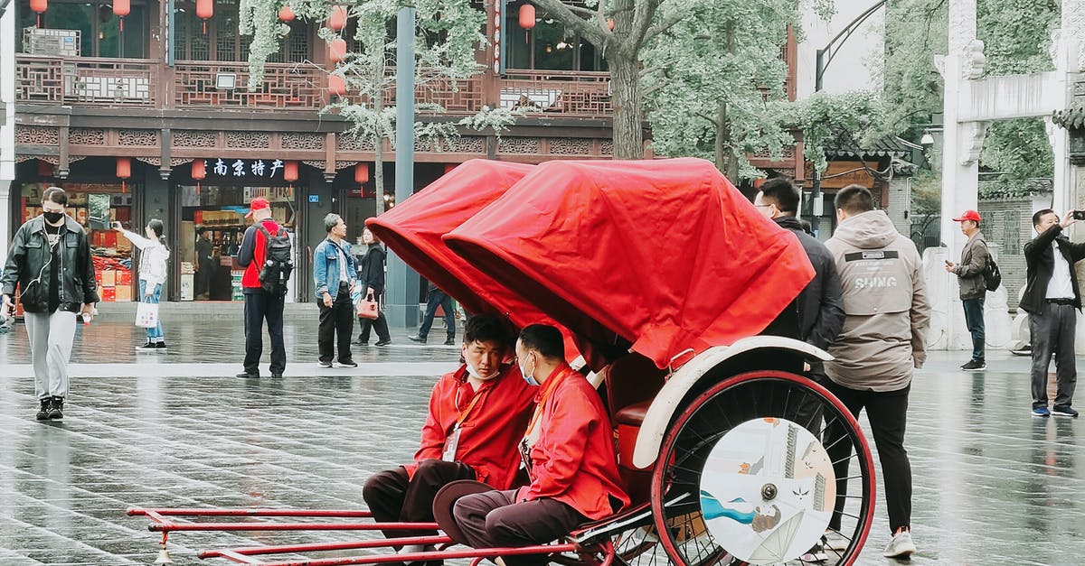 How to obtain a tourist visa for Abkhazia? - Man in Red Jacket Sitting on Red and White Stroller How to obtain a tourist visa for Abkhazia? - Man in Red Jacket Sitting on Red and White Stroller