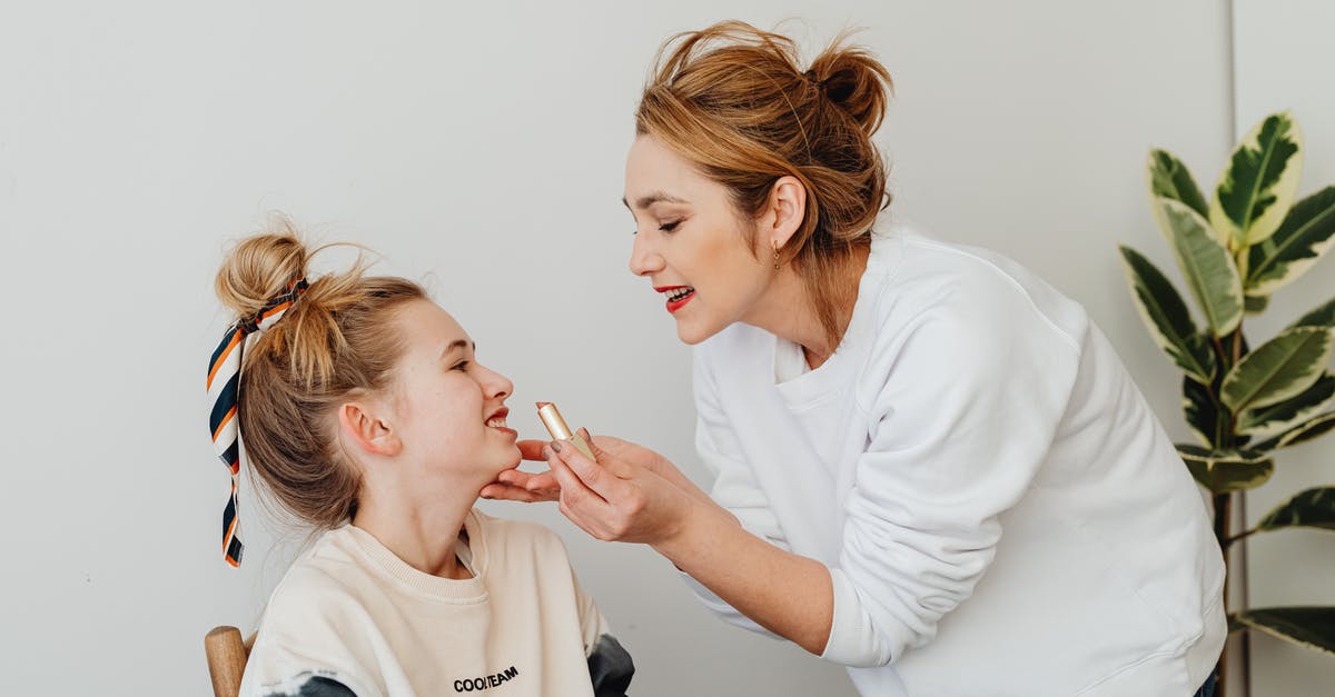 How to proceed with applying for UK Standard Visitor Visa for my family if primary is applying later - Photograph of a Mother Applying Lipstick on Her Daughter How to proceed with applying for UK Standard Visitor Visa for my family if primary is applying later - Photograph of a Mother Applying Lipstick on Her Daughter