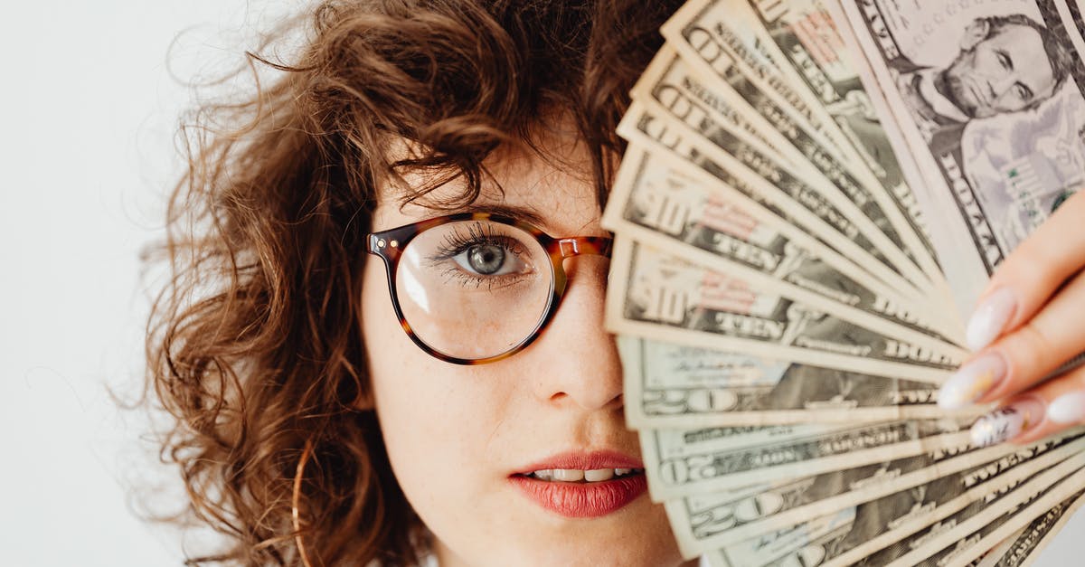 How to prove sufficient funds when entering the US? - Woman in Eyeglasses Covering Her Face with Paper Money How to prove sufficient funds when entering the US? - Woman in Eyeglasses Covering Her Face with Paper Money