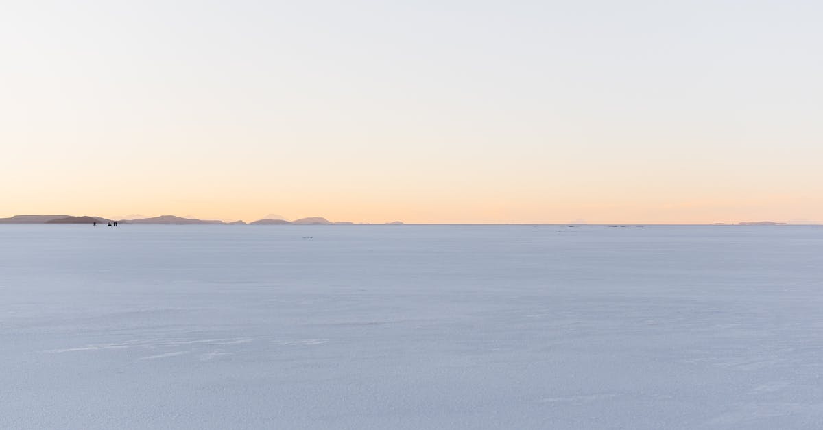 How to reach Salar de Uyuni from Potosí or Sucre (Bolivia)? - Calm Sea Under Orange Sky during Sunset How to reach Salar de Uyuni from Potosí or Sucre (Bolivia)? - Calm Sea Under Orange Sky during Sunset