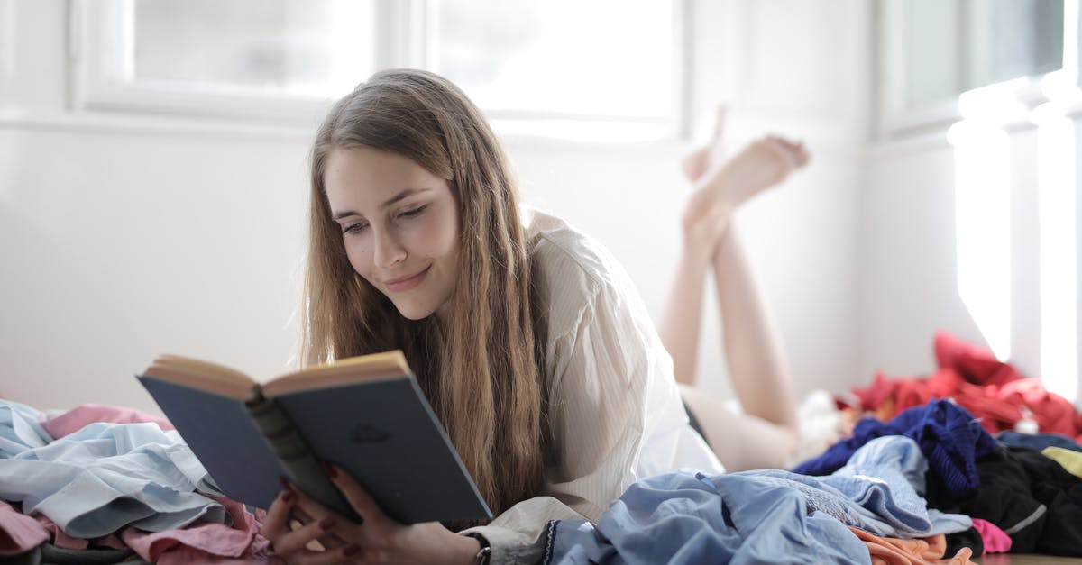 How to read female clothing labels in Poland? [closed] - Woman Lying Down While Reading a Book