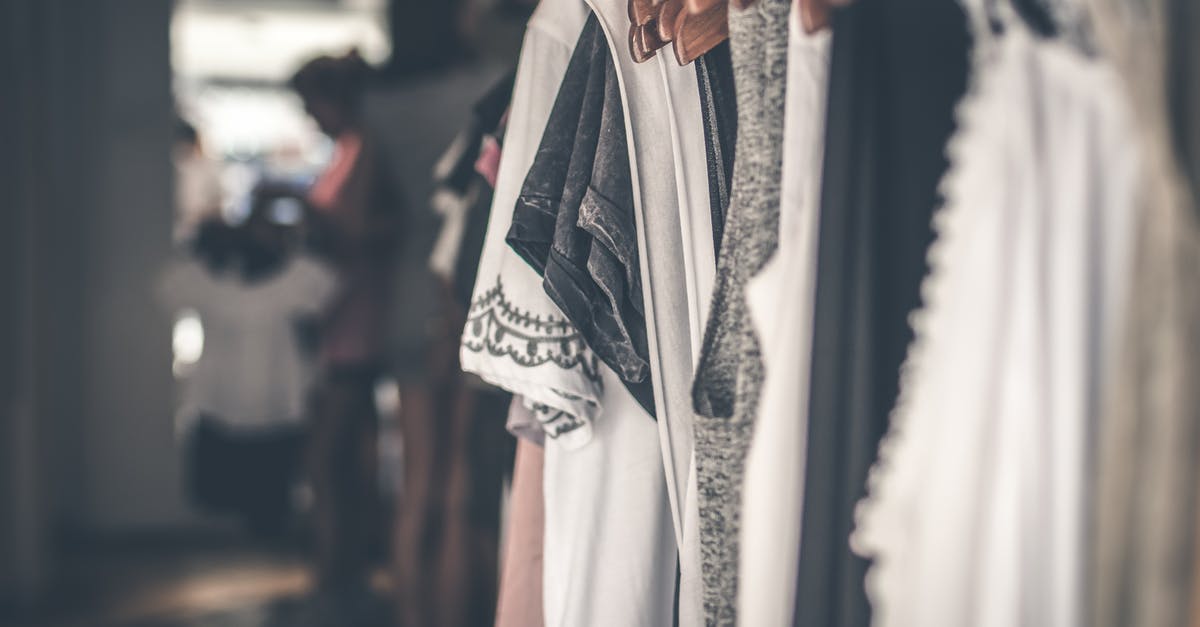 How to read female clothing labels in Poland? [closed] - White and Black Floral Cap-sleeved Shirt
