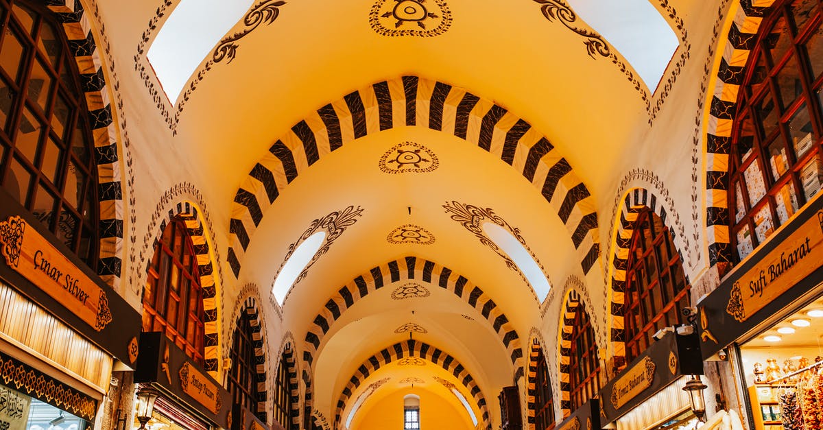 How to recognize a good sushi place when abroad? - Ornamental ceiling with arched windows in market How to recognize a good sushi place when abroad? - Ornamental ceiling with arched windows in market