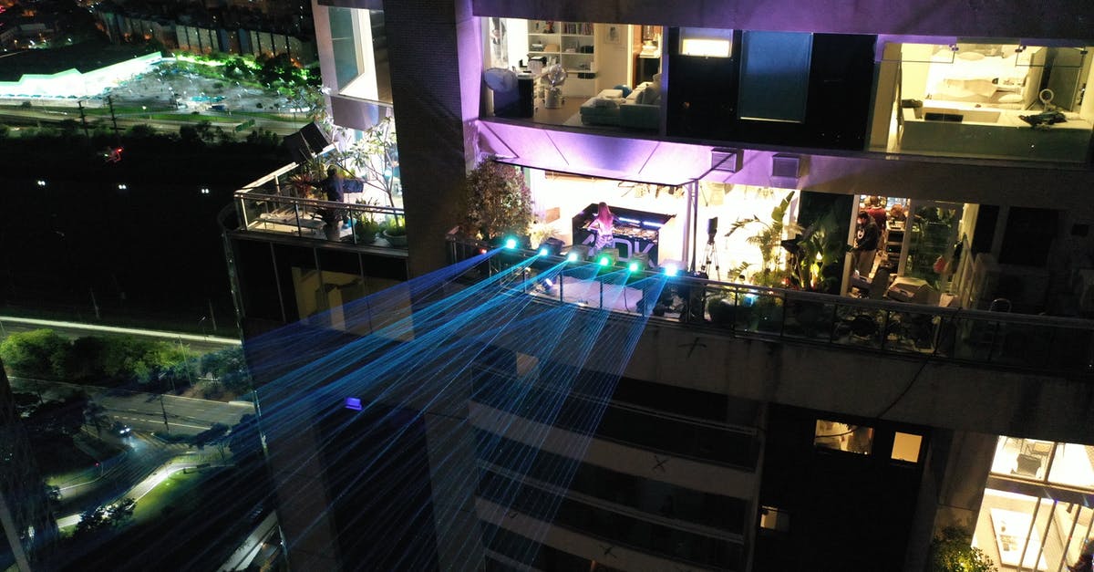 How to see the light show at Galata Tower? - Modern skyscraper with glowing laser projectors at night How to see the light show at Galata Tower? - Modern skyscraper with glowing laser projectors at night