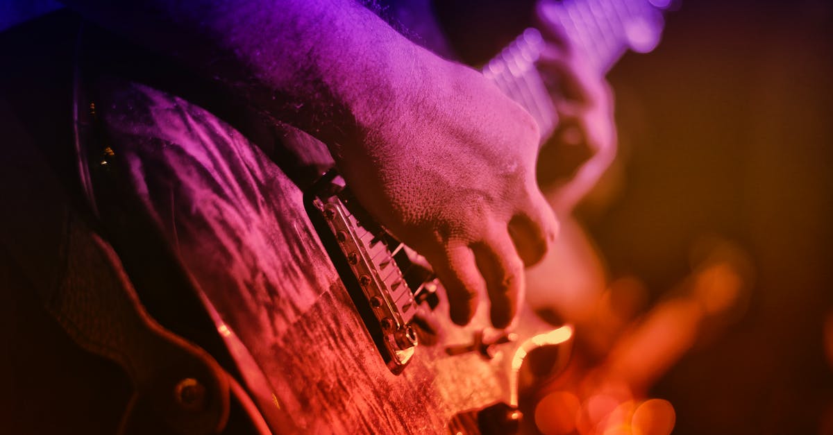 How to see the light show at Galata Tower? - Person Playing String Instruments How to see the light show at Galata Tower? - Person Playing String Instruments