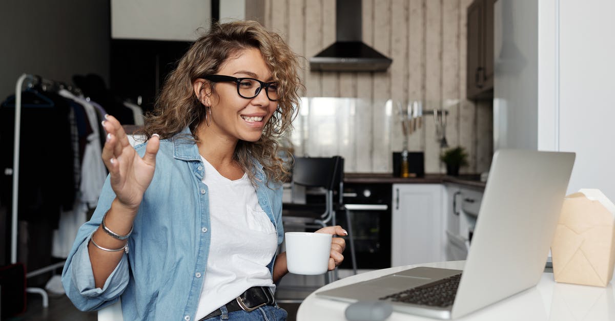How to stay connected with friends, family while abroad? - Woman Using Laptop Doing A Video Call How to stay connected with friends, family while abroad? - Woman Using Laptop Doing A Video Call