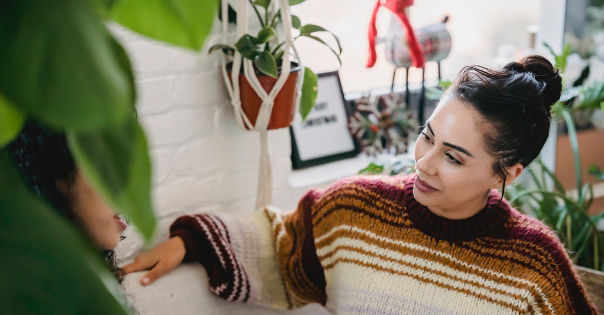 How to tell if an apartment listing is legit and booking is valid? - From above of young female in casual clothes sitting on comfortable couch and talking to friend while resting in cozy room How to tell if an apartment listing is legit and booking is valid? - From above of young female in casual clothes sitting on comfortable couch and talking to friend while resting in cozy room