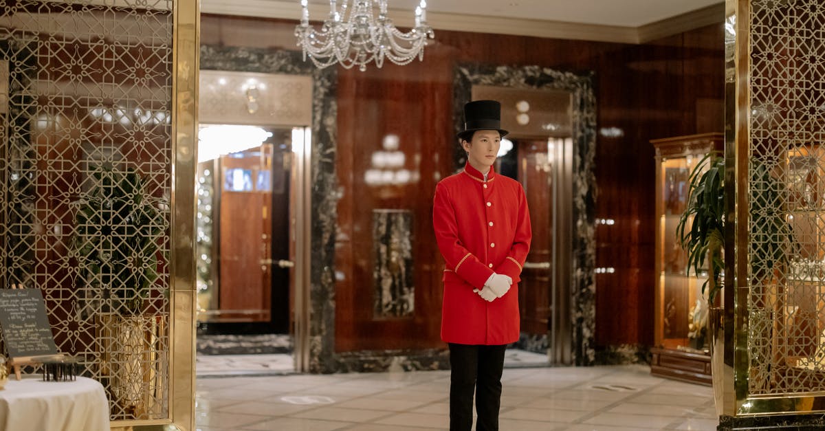 How to tip a concierge or a hotel porter? - Man in Red Uniform How to tip a concierge or a hotel porter? - Man in Red Uniform