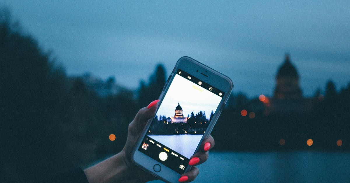 How to travel from/to Washington Dulles and Annapolis? - Person Holding Iphone How to travel from/to Washington Dulles and Annapolis? - Person Holding Iphone