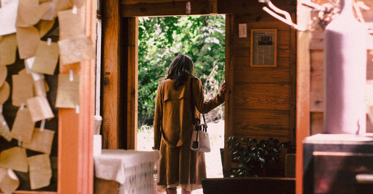 How to turn in FMM and get exit stamp in passport if leaving Mexico by Greyhound bus? - Woman Standing Near Open Door About to Step Outside How to turn in FMM and get exit stamp in passport if leaving Mexico by Greyhound bus? - Woman Standing Near Open Door About to Step Outside